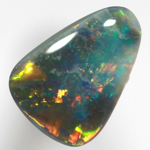 SOLID BLACK OPAL Bright and sparkling gold, cherry red over blue